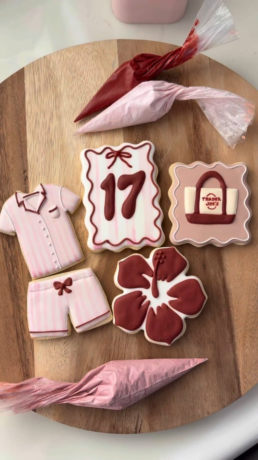 Pink pajama cookies, a number 17, a flower, and a little tote